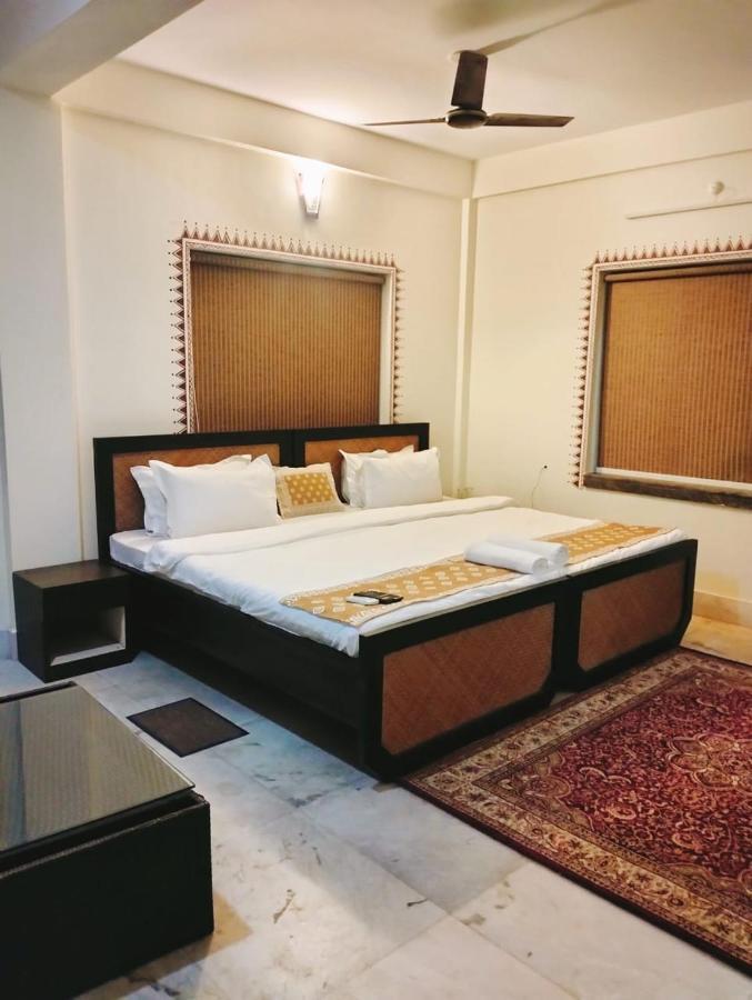 Hotel Kolam ชานตี นิเคทัน ภายนอก รูปภาพ